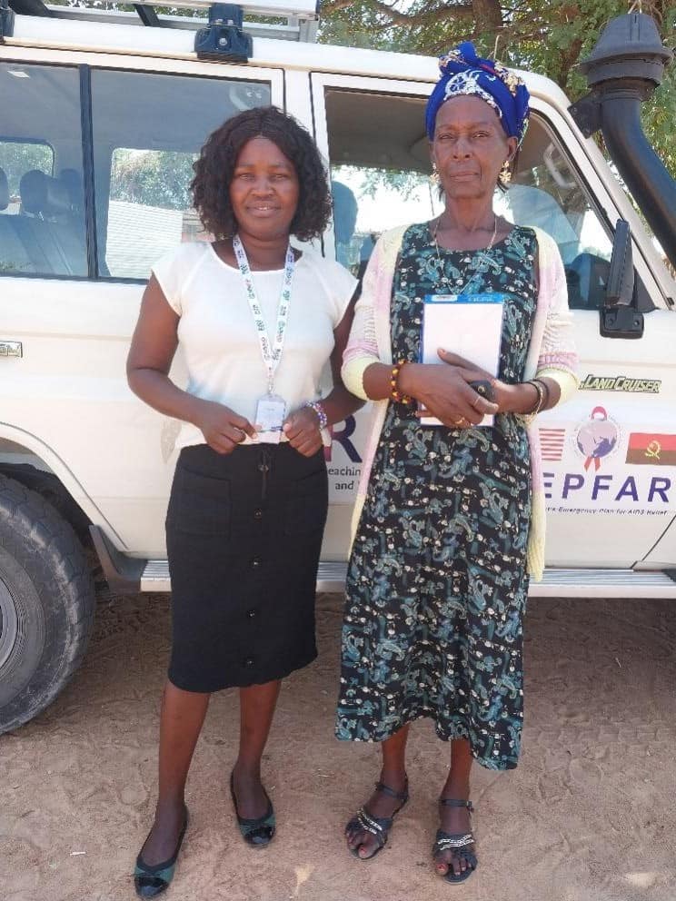 RISE provincial program officer Ruth Bernardeth (left) and TBA Paula (right) meet in Cunene province.